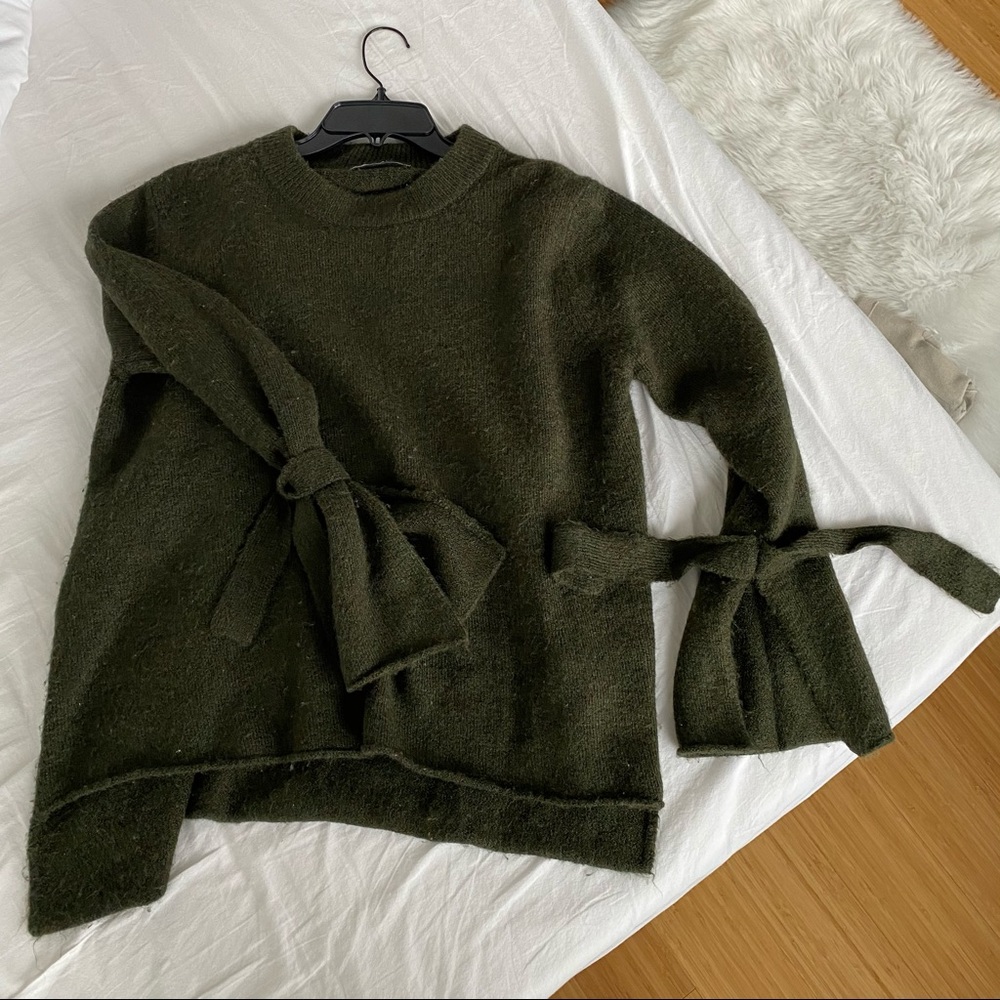 Split sleeve sweater
